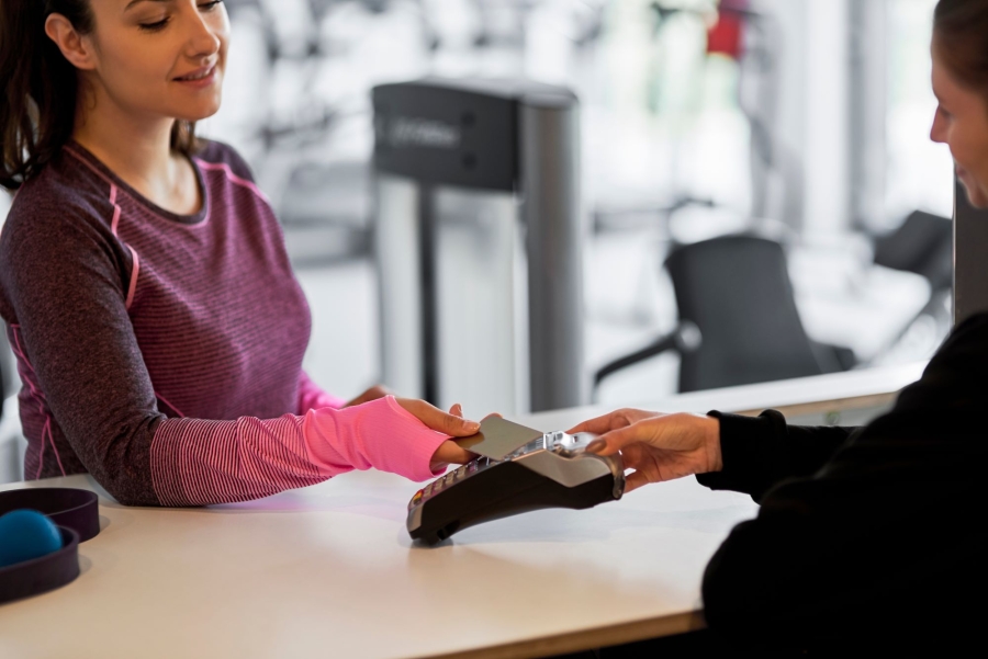 woman paying by card