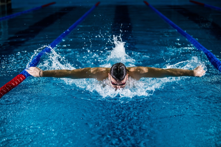 A man swimming in a pool